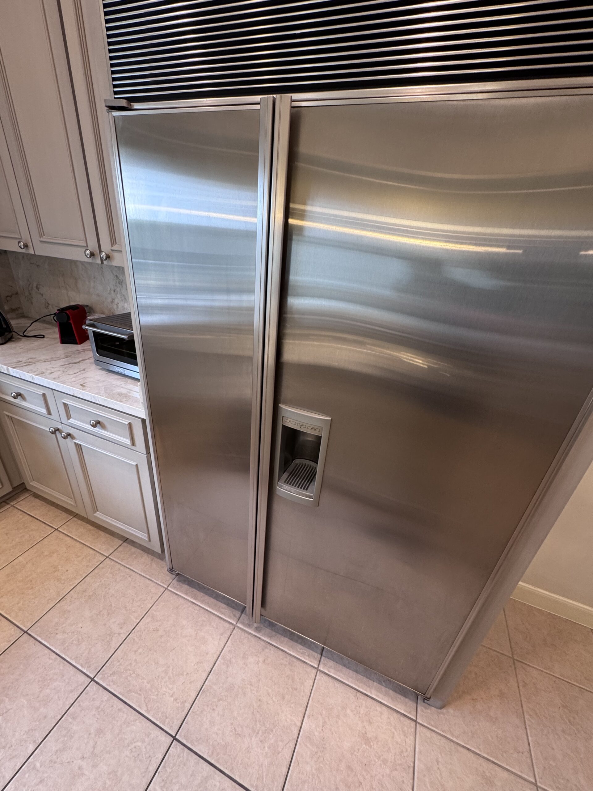 Sub-Zero refrigerator exterior before ice maker repair in Houston