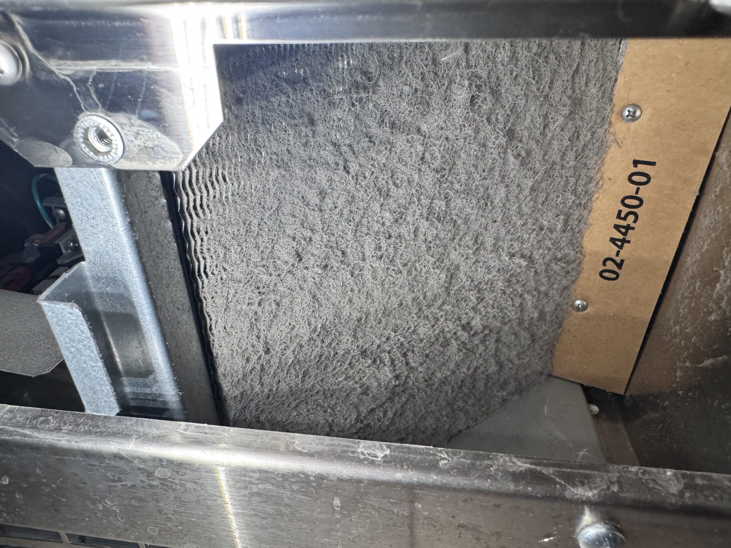 Completely clogged condenser air filter Scotsman SCN60 ice machine - maintenance Houston TX