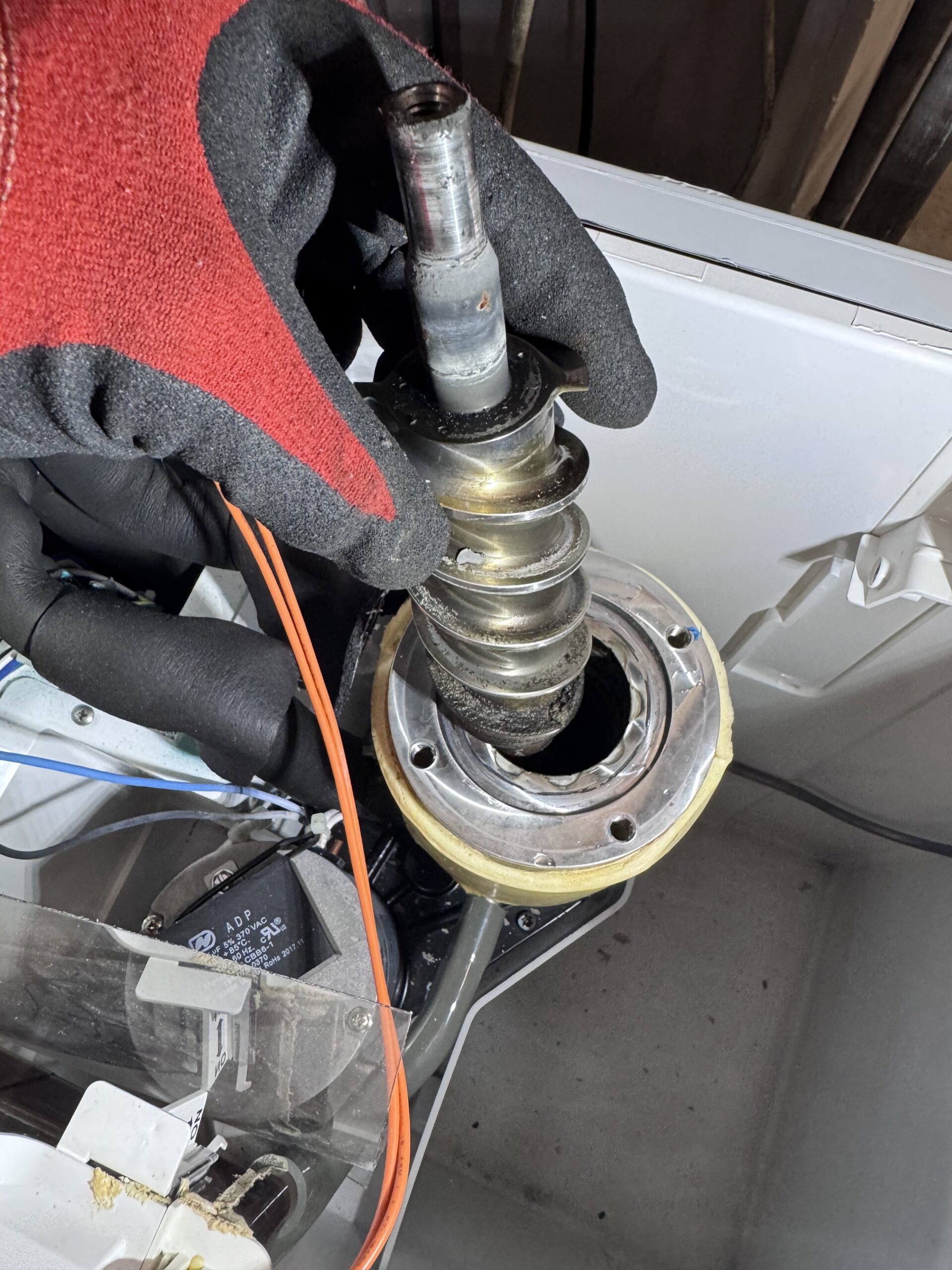 Scotsman SCN60 auger shaft with scratches from failed graphite bearing - ice machine repair Houston TX